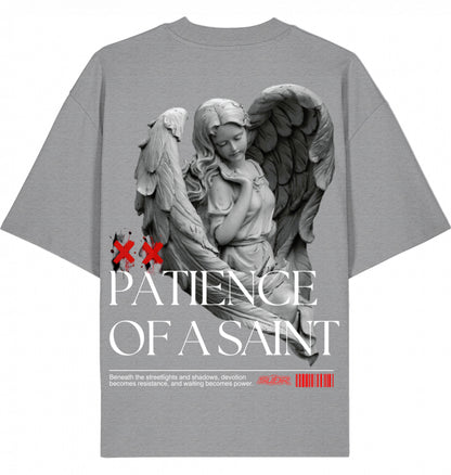 VESTR SAINT – Oversized Tee in Heather Grey, Engel-Backprint „Patience of a Saint“ von SUÐR