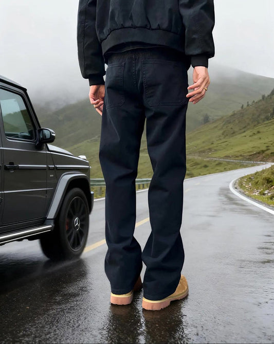 SUÐR Signature Flared Jeans Schwarz