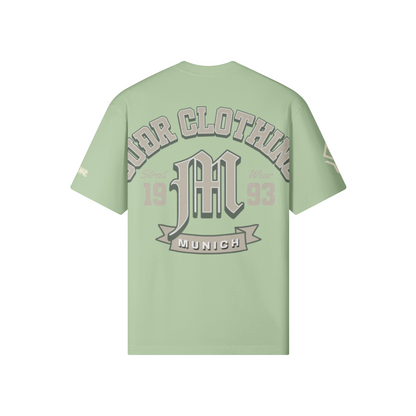 SUÐR M Shirt – Shirt in Light Mint, Rückseite mit SUÐR CLOTHING im Bogen, das M in Blackletter, dazu „Street Wear", „19 93" und das MUNICH-Banner