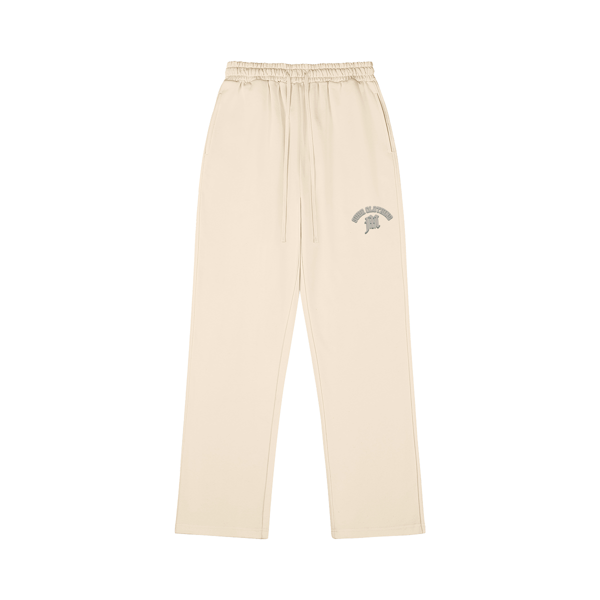 SUÐR M Sweatpants – Sweatpants in Rice Apricot, Vorderseite mit kleinem SUÐR CLOTHING M-Druck auf dem Oberschenkel